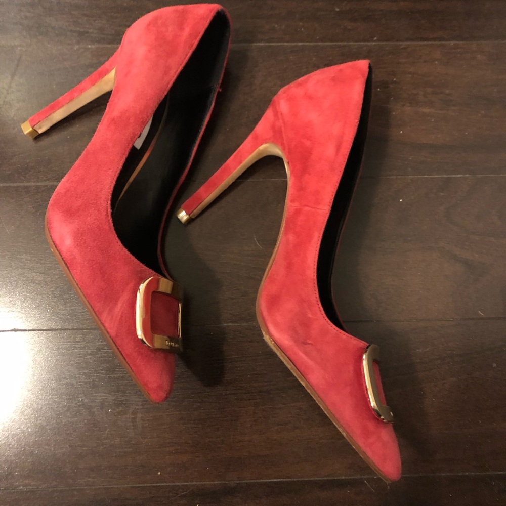 Shoes leather red pumps.